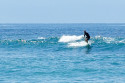 Surfer vor der Pulau Serangan, Bali