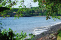 Der Strand ist zwar steinig, aber unter Wasser stört das wenig. Weshalb Tulamben ein beliebtes Ziel für Taucher ist Strand von Tulamben, Bali